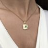 Square emerald & diamond pendant