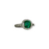 Step cut emerald in quirky round setting