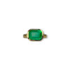 Bezel set emerald cut