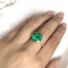 Big round bezel set Colombian emerald ring
