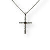 Round Colombian emerald and tapered baguette diamond cross