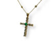 Round Colombian emerald and tapered baguette diamond cross