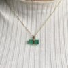 Rough emerald pendant