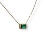 Trilogy of baguette cut emerald pendant