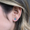 Emerald and shapphire halo studs