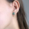 Muzo emerald studs with art deco diamond jackets