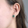 Muzo emerald studs with art deco diamond jackets