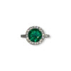 Round brilliant Colombian emerald with diamond halo