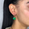 Important cushion cut earrings in a ‘high polish’ setting