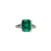 Fine classic emerald cut three stone ring