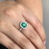 Classic Colombian emerald halo ring