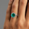 Round Brilliant Colombian Emerald With Diamond Halo