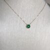 Classic cabochon emerald necklace in a delicate bezel setting