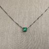 Classic round emerald pendant