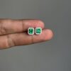 Studs with diamond jackets square emerald cut