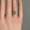 Teardrop emerald & diamond halo ring