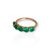 Half eternity emerald ring