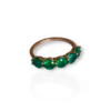 Half eternity emerald ring