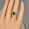 East – west cabochon emerald ring