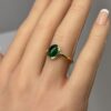 East – west cabochon emerald ring
