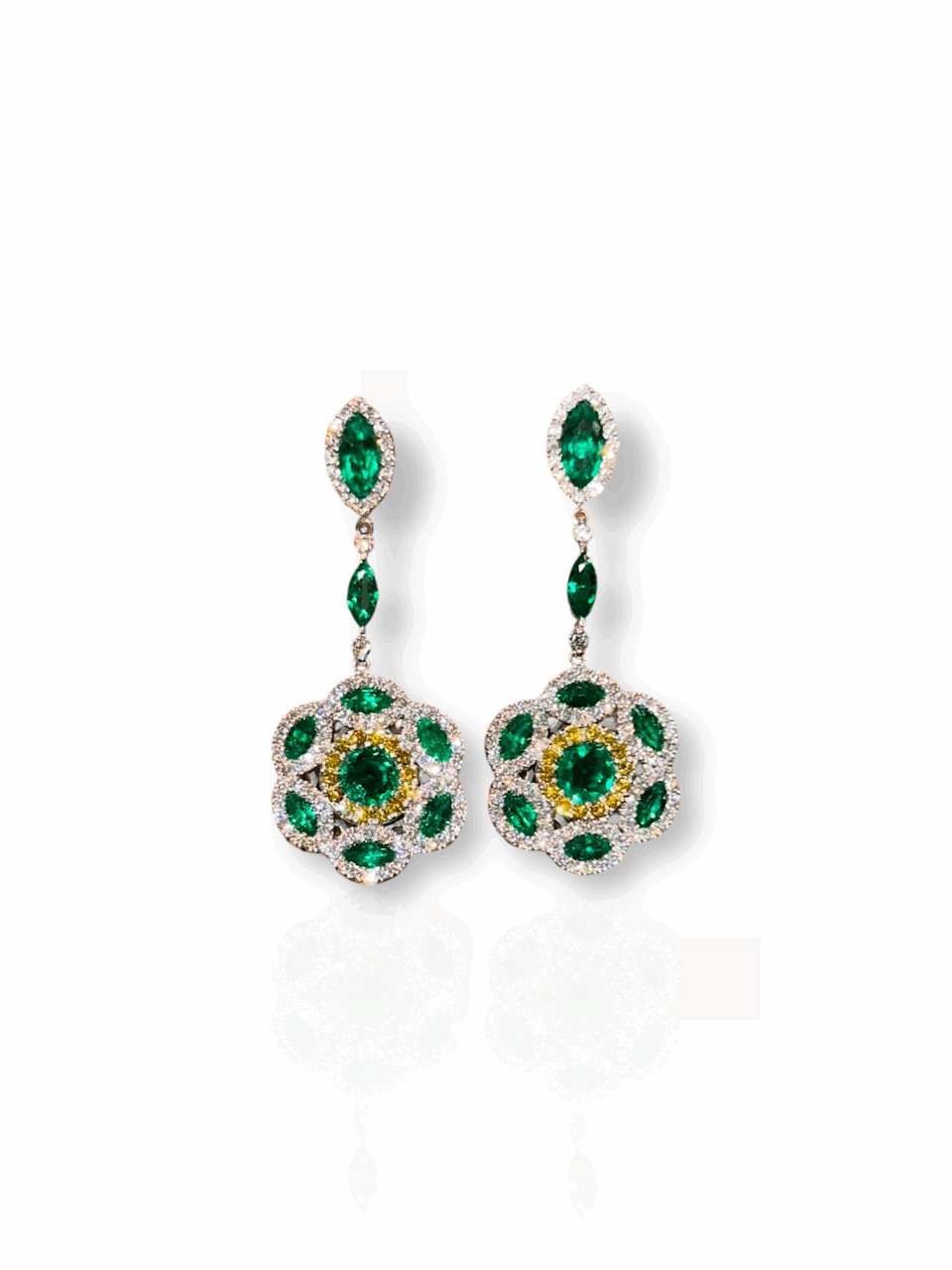 Marquise cut emeralds and fancy vivid yellow diamond earrings