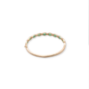 Brushed 18k bezel set emerald bangle