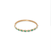 Brushed 18k bezel set emerald bangle