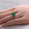 Classic three stone emerald ring