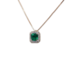 0.81 Emerald pendant with diamond halo
