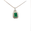 0.81 Emerald Charm with diamond detailing